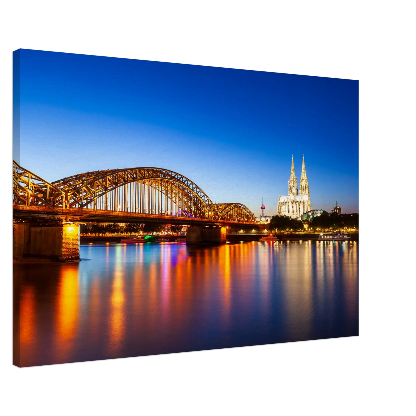 Stimmungsvolle Wandkunst für stilvolle Räume. Köln bei Nacht – Hochwertiger Leinwanddruck für Wohnzimmer & Büro: passt in jedes Ambiente. Eine besondere Bereicherung für jeden Raum.
