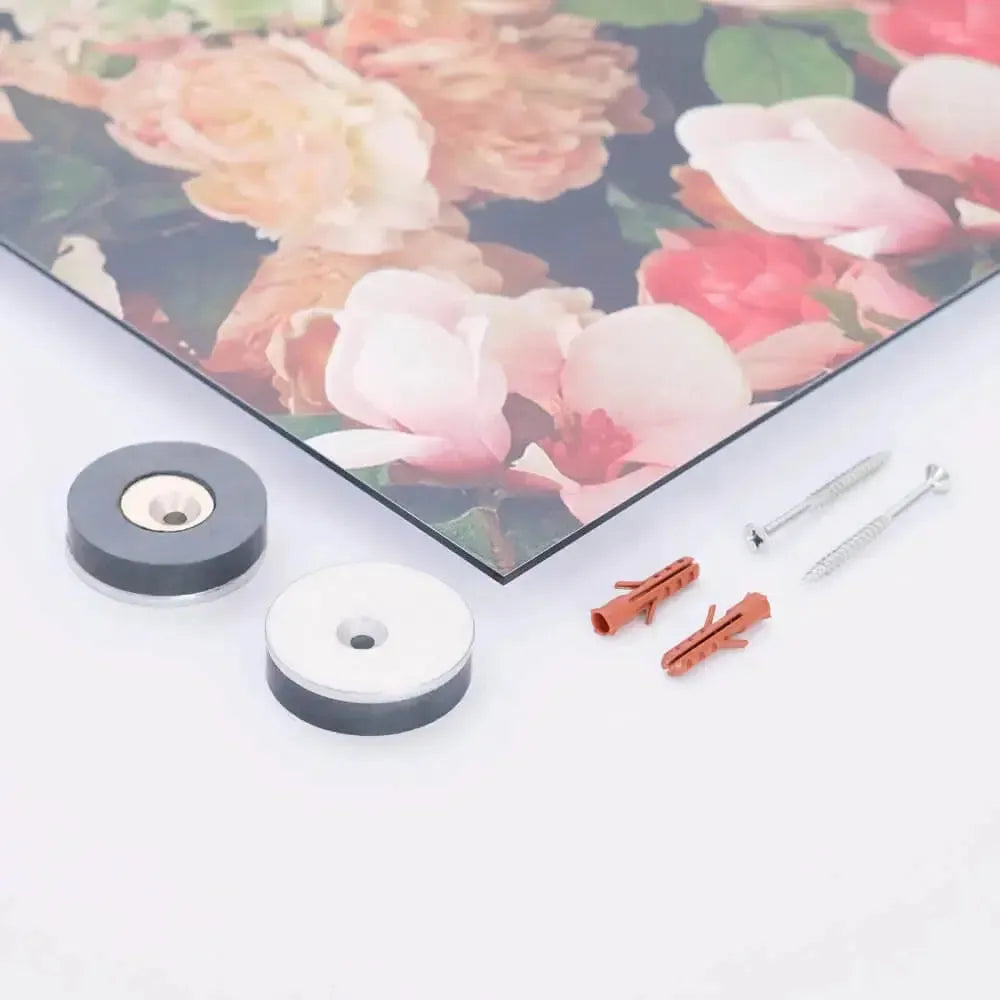 Vibrant floral artwork on aluminum with mounting accessories, showcasing soft pink and peach flowers against a dark backdrop.